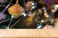 Empty wood table top and blur of glittering shine bulbs night li Royalty Free Stock Photo