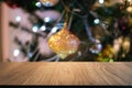 Empty wood table top and blur of glittering shine bulbs night li Royalty Free Stock Photo
