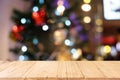 Empty wood table top and blur of glittering shine bulbs night li Royalty Free Stock Photo