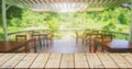 Empty wood table top with blur outdoor with nature view.