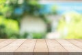 Empty wood table top on blurred background at garden in shopping mall, copy space for montage you product Royalty Free Stock Photo
