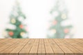 Empty wood table top on blurred background from christmas tee Royalty Free Stock Photo