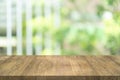 Empty wood table top on blurred background at garden in shopping mall, copy space for montage you product Royalty Free Stock Photo