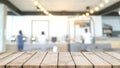 Empty wood table top and blurred coffee shop, cafe and restaurant interior background - can used for display or montage your Royalty Free Stock Photo