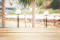 Empty wood table top and blurred summer beach in tropical resort banner background , display or montage ,copy space Royalty Free Stock Photo