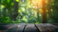 Empty wood table top on bokeh and blur abstract green background with golden lights. Product display template Royalty Free Stock Photo