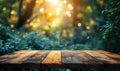 Empty wood table top on bokeh and blur abstract green background with golden lights. Product display template Royalty Free Stock Photo