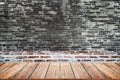 Empty wood table top and brick background with copy space. Royalty Free Stock Photo