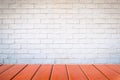 Empty wood table top and brick background with copy space. Royalty Free Stock Photo