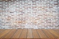 Empty wood table top and brick background with copy space. Royalty Free Stock Photo