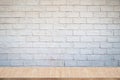 Empty wood table top and brick background with copy space. Royalty Free Stock Photo