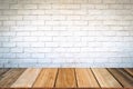 Empty wood table top and brick background with copy space. Royalty Free Stock Photo