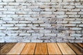 Empty wood table top and brick background with copy space. Royalty Free Stock Photo