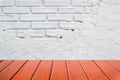 Empty wood table top and brick background with copy space. Royalty Free Stock Photo
