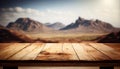 Empty wood table top with the mountain landscape. The blurred landscape of mountains background. Royalty Free Stock Photo