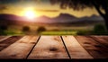 Empty wood table top with the mountain landscape. The blurred landscape of mountains background. Royalty Free Stock Photo