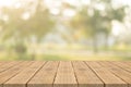 Empty wood table top on nature green blurred background at garden,space for montage show products Royalty Free Stock Photo