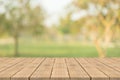 Empty wood table top on nature green blurred background at garden,space for montage show products Royalty Free Stock Photo