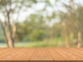 Empty wood table top on nature green blurred background at garden,space for montage show products Royalty Free Stock Photo