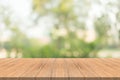 Empty wood table top on nature green blurred background at garden,space for montage show products Royalty Free Stock Photo