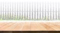 Empty wood table top with snowfall of winter season on fence Royalty Free Stock Photo