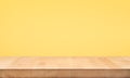 Empty of wood table top on yellow pastel color background.For montage product display or design key visual Royalty Free Stock Photo