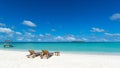 Empty wooden beach chairs on the tropical beach, vacation. Traveler dreams concept Royalty Free Stock Photo