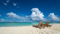 Empty wooden beach chairs on the tropical beach, vacation. Traveler dreams concept Royalty Free Stock Photo