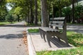 Empty Wood Bench at Flushing Meadows Corona Park in Queens of New York City during Summer Royalty Free Stock Photo