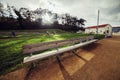 Empty wooden bench in the city park at sunset time. San Francisco Golden Gate Park. Royalty Free Stock Photo