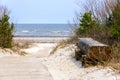 Empty wooden bench near the Baltic sea in Jurmala, Latvia