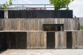 Empty wooden benches on the roof of a building