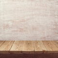 Empty wooden board table over painted white wall background for product montage Royalty Free Stock Photo