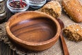 Empty wooden bowl and spoon for eating on old boards Royalty Free Stock Photo
