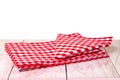 Empty wooden bright desk table with red checkered tablecloth isolated on a white background. Template for your food and product Royalty Free Stock Photo