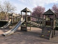 Empty wooden children playground with slide in spring park Royalty Free Stock Photo