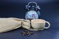 Empty wooden coffee cup with coffee bean and bag on black color background. Royalty Free Stock Photo