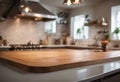 Empty Wooden Countertop With Defocused Kitchen Background stock photoKitchen, Food, Stove, Table, Backgrounds Royalty Free Stock Photo