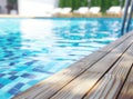 Empty wooden deck with swimming pool Royalty Free Stock Photo