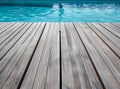 Empty wooden deck with swimming pool Royalty Free Stock Photo