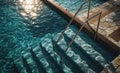 Empty wooden deck swimming pool steps with clear water surface background Royalty Free Stock Photo