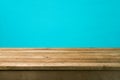 Empty wooden deck table over blue wall background for product montage Royalty Free Stock Photo