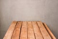 Empty wooden deck table over grunge wall background for product montage Royalty Free Stock Photo