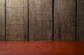 Empty wooden desk table and cloth, Old brown dark wood wall texture and pattern background for design Royalty Free Stock Photo