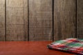 Empty wooden desk table and cloth, Old brown dark wood wall texture and pattern background for design Royalty Free Stock Photo