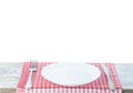 Empty wooden desk table and red checked tablecloth over mint wallpaper background Royalty Free Stock Photo