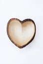 Empty wooden dish heart shape.
