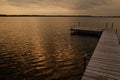 The empty wooden dock as the sun sets Royalty Free Stock Photo