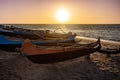 Empty wooden fishing boat on the shore of Anakao beach, waiting for the next catch of the day in Madagascar Royalty Free Stock Photo