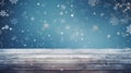 Empty wooden floor with blur snow background for winter holiday. Frosty Christmas background. Snowflakes falling on wood table Royalty Free Stock Photo